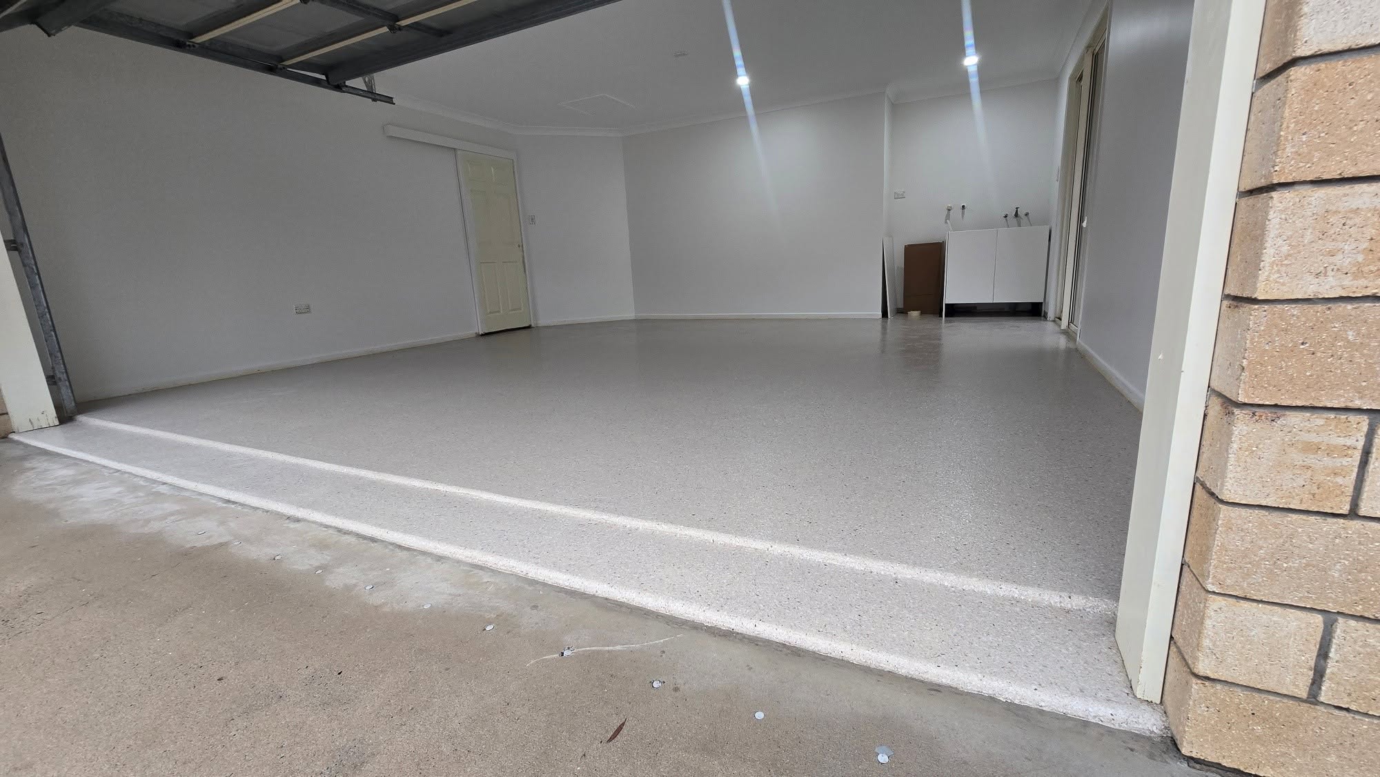 Garage Transformation — Sandstone Hyperflake